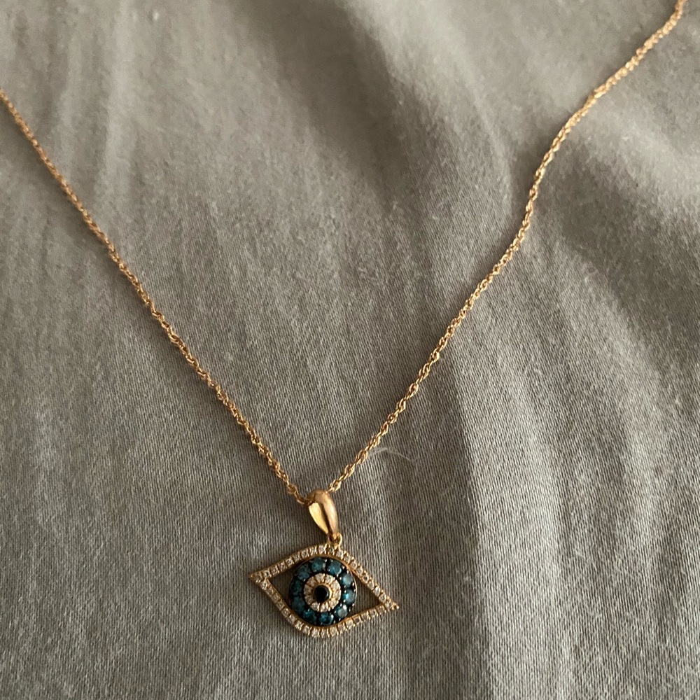 Yellow gold eye necklace